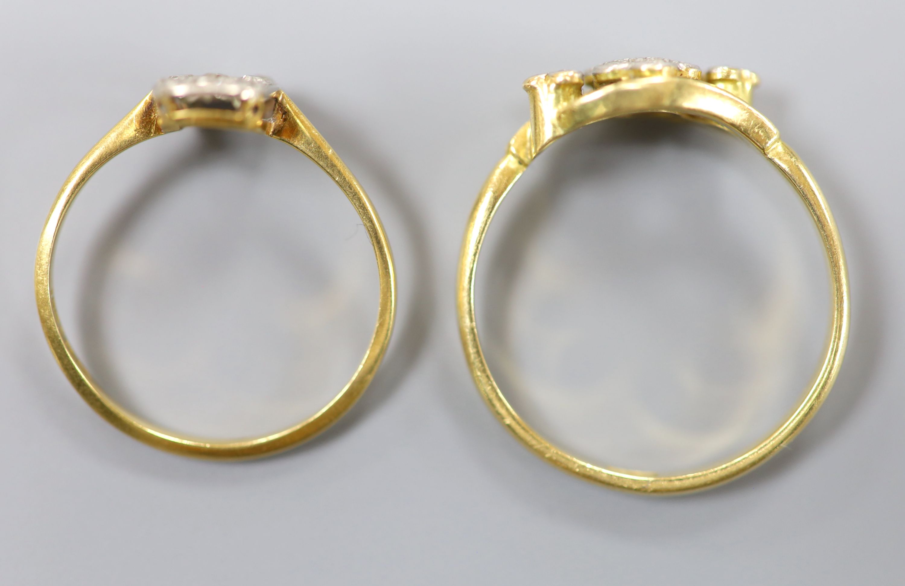 Two diamond set rings